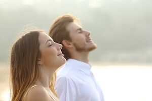 Man and woman breathing