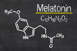 Melatonin chemical properties written on a chalkboard